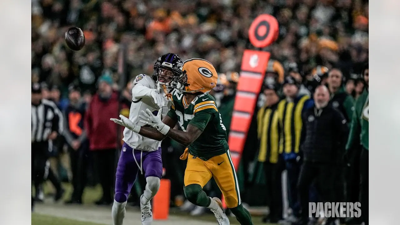 Romeo Doubs reaches for a pass against Baltimore at Lambeau Field, December 27, 2025.